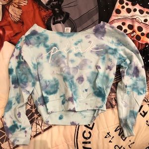 Pre-cut sweater hangs off shoulder